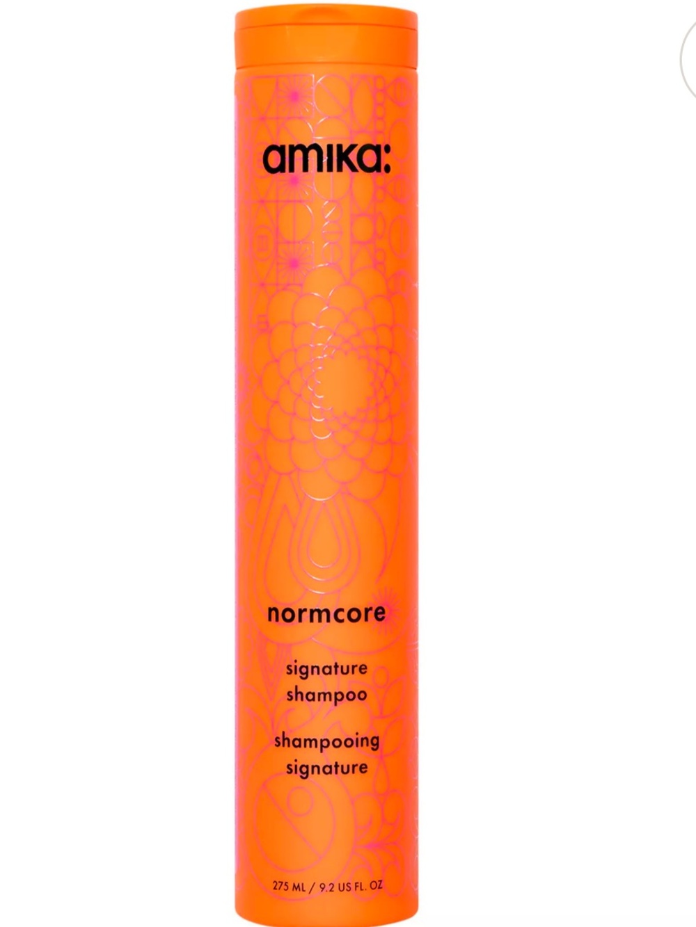 amika Normcore Signature Shampoo - Vibrant Orange Bottle with Black Logo
